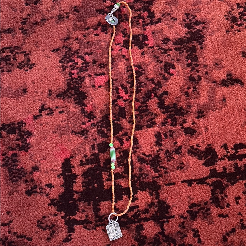 Beaded Necklace With Silver Pendant